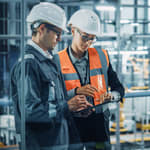 Workers in warehouse setting